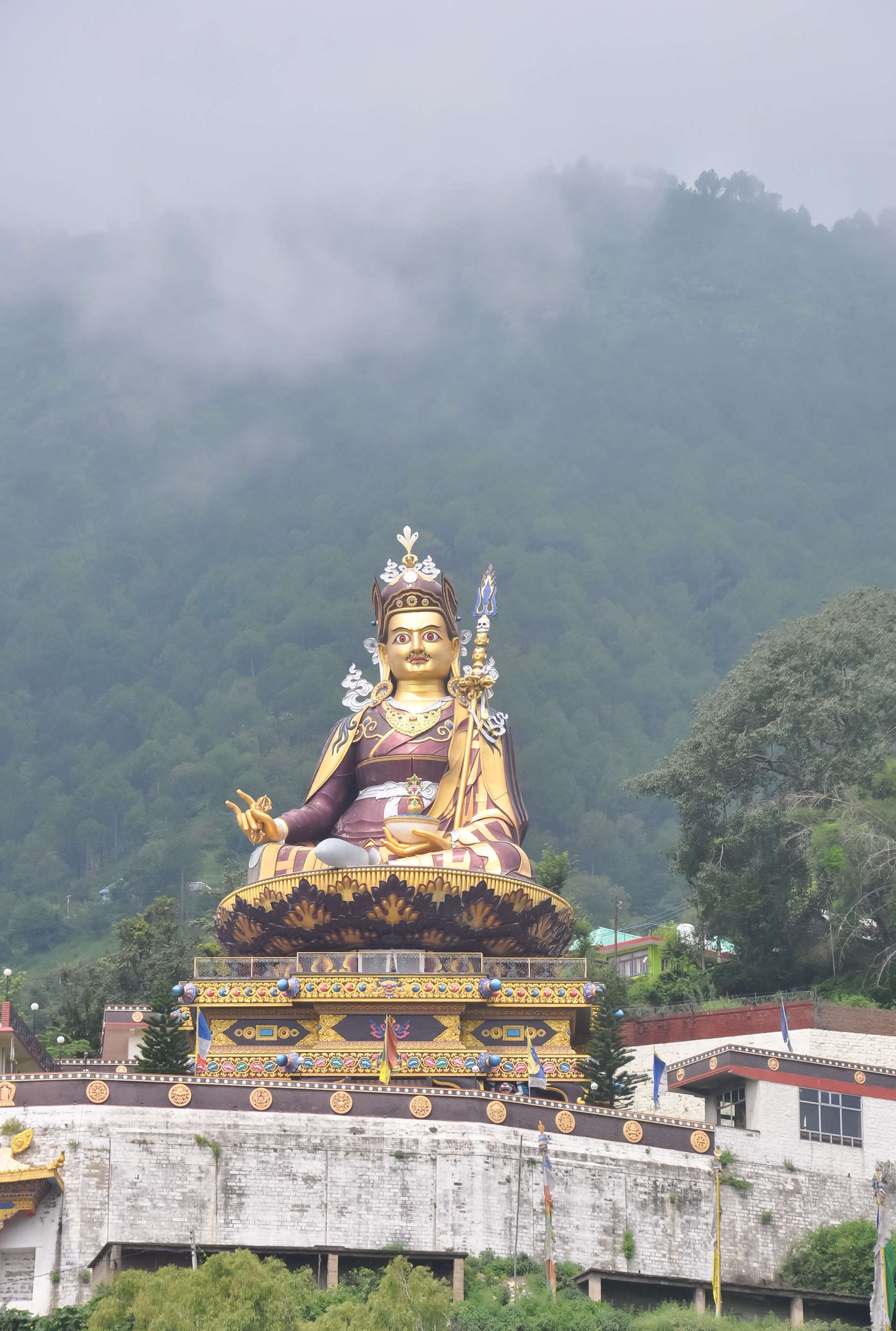 Beautiful view of giant statue of Padmasambhava (Guru Rinpoche) in Rewalsar lake (Tso Pema), Himachal Pradesh, India